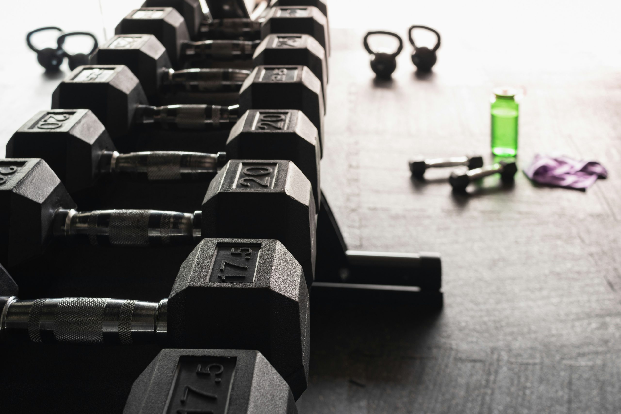 Kettlebells on a home gym floor